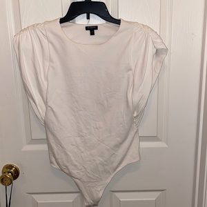 “Express” cream, shoulder padded bodysuit; size small; worn once for pictures